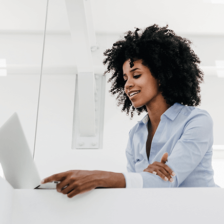 More Benefits of ACH Online woman on laptop