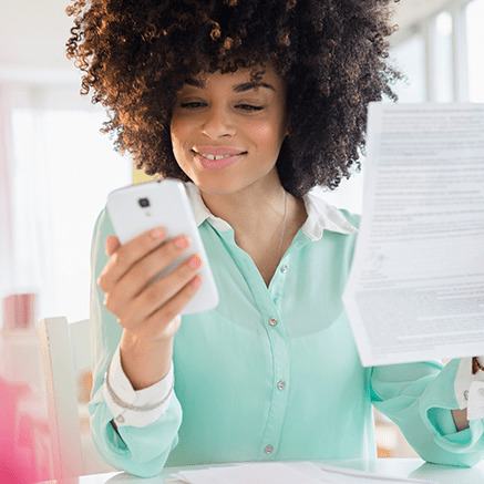 FREE Features woman looking at mobile phone