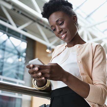 PREMIER Supports You woman using mobile phone