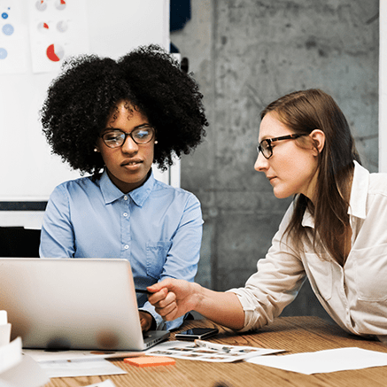 Line of Credit Overdraft Protection two women looking at laptop