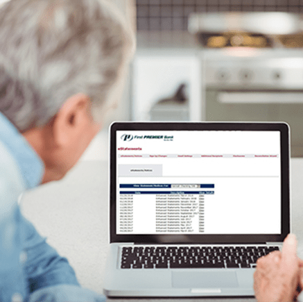 Benefits man looking at computer monitor