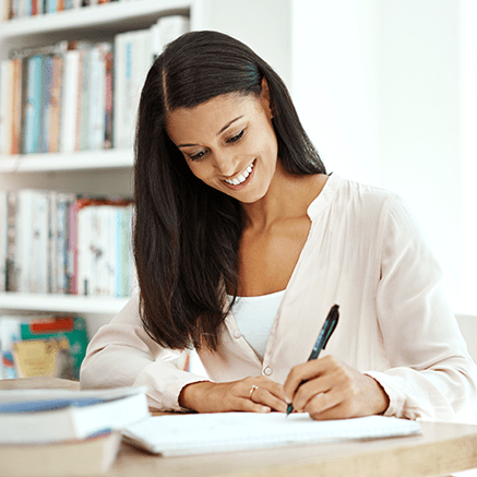 Account Features woman writing at desk