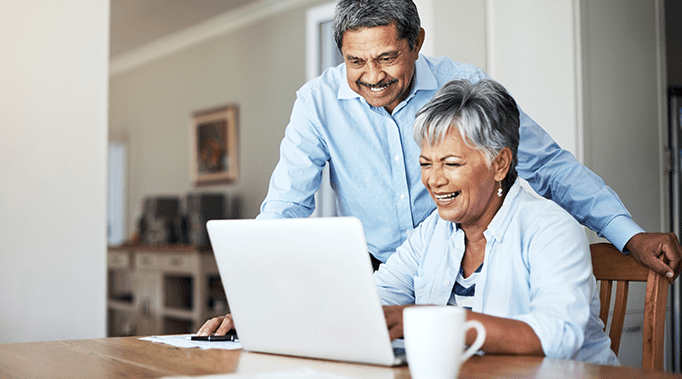 couple looking at laptop