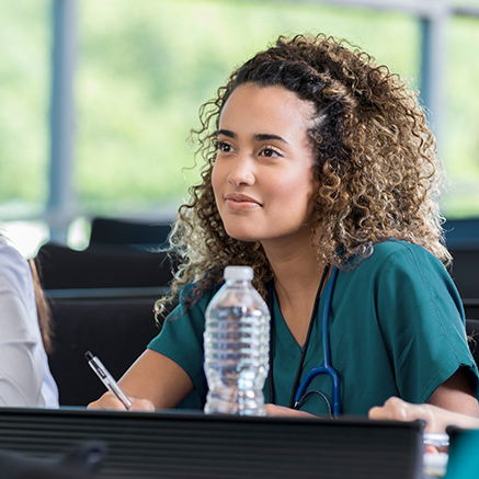 Graduate Loan Options with Ascent students in scrubs with stethoscope
