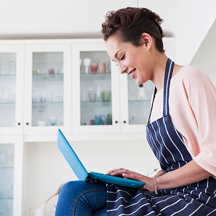Manage Payables Efficiently woman on laptop