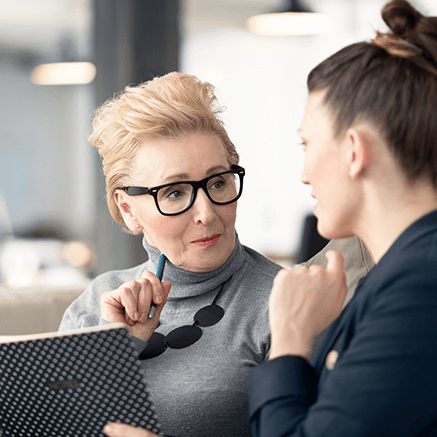 More Benefits & Solutions two women talking