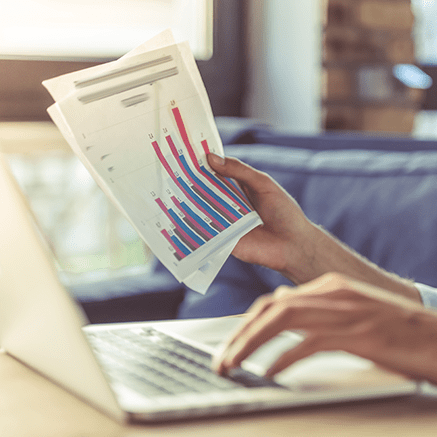 Powerful Positive Pay® Fraud Prevention female looking at reports