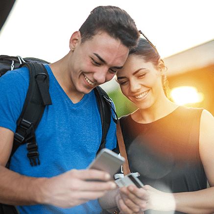FREE with Mobile Banking couple using mobile phone