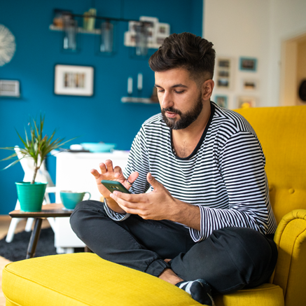 man looking at tablet